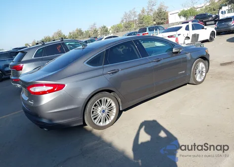 2014 Ford Fusion Hybrid Se z USA, uszkodzony, nr VIN 3FA6P0LUXER256048